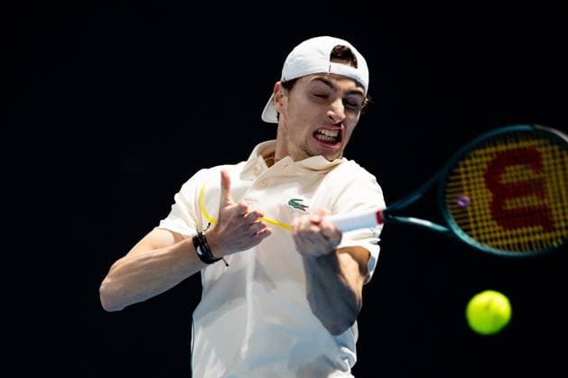 (240118) -- MELBOURNE, Jan. 18, 2024 -- Ugo Humbert of France hits a return during the men s singles second round match Ugo Humbert of France and Zhang Zhizhen of China at the Australian Open tennis tournament in Melbourne, Australia, Jan. 18, 2024. (Photo by Xinhua) (SP)AUSTRALIA-MELBOURNE-TENNIS-AUSTRALIAN OPEN ChuxChen 