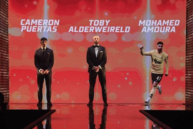 240118 Gala Gouden Schoen 2024 Nominees Cameron Puertas , Toby Alderweireld and a banner of Mohamed Amoura pictured during the 70 th men edition of the Goldens Shoe Award ceremony and the 8 th Women s edition. The Golden Shoe , Gouden Schoen , Soulier d™Or is an award for the best soccer player of the Belgian Jupiler Pro League championship during the year 2023. The female award is for the best Belgian female player of 2023. On Thursday 18 January 2024 in Antwerp , BELGIUM . (Photo by Frank Abbeloos & Stijn Audooren Isosport) ANTWERP BELGIUM  Copyright: xx 430850