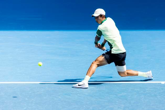 MELBOURNE, VIC - JANUARY 20: Juncheng Shang of China in action during the 3rd round of the 2024 Australian Open on January 20 2024, at Melbourne Park in Melbourne, Australia. (Photo by Jason Heidrich Icon Sportswire) TENNIS: JAN 20 Australian Open EDITORIAL USE ONLY Icon240120148