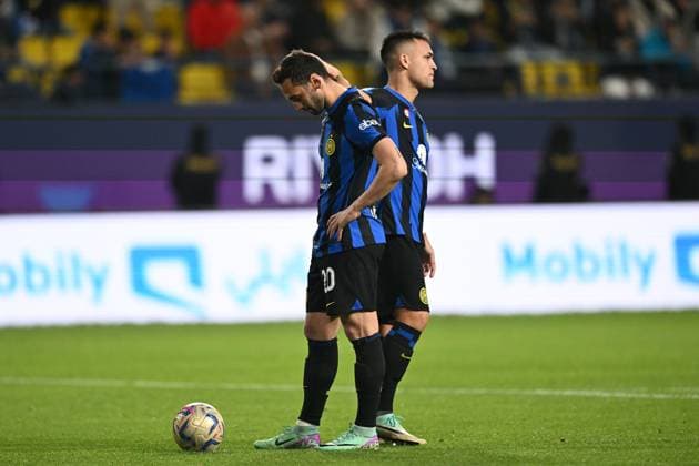 Hakan Calhanoglu (Inter)Lautaro Martinez (Inter) during the Italian Italy SuperCup match between Inter 3-0 Lazio at Al -Awwal Stadium on Riyad January 19 , 2023 in Florence Italy. Noxthirdxpartyxsales  (241304205)