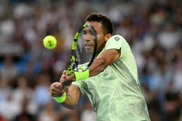 TENNIS AUSTRALIAN OPEN, Felix Auger-Aliassime of Canada in action during his 3rd round match against Daniil Medvedev of Russia on Day 7 of the 2024 Australian Open at Melbourne Park in Melbourne, Saturday, January 20, 2024. ( NO ARCHIVING, EDITORIAL USE ONLY, NO USE IN BOOKS WITHOUT CONSENT MELBOURNE VICTORIA AUSTRALIA  Copyright: xLUKASxCOCHx 20240120001891299087