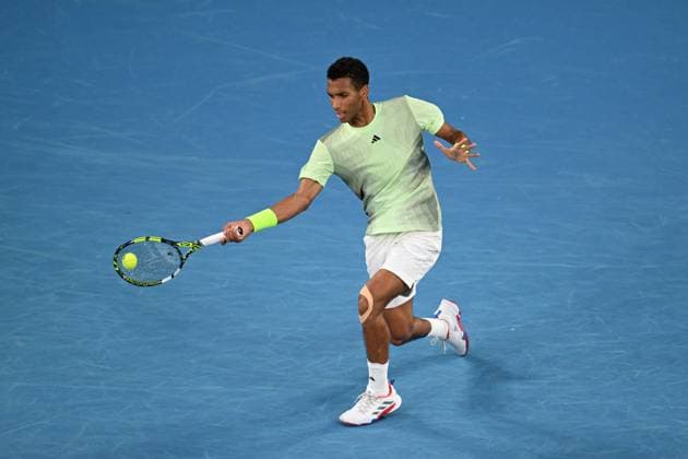 TENNIS AUSTRALIAN OPEN, Felix Auger-Aliassime of Canada in action during his 3rd round match against Daniil Medvedev of Russia on Day 7 of the 2024 Australian Open at Melbourne Park in Melbourne, Saturday, January 20, 2024. ( NO ARCHIVING, EDITORIAL USE ONLY, NO USE IN BOOKS WITHOUT CONSENT MELBOURNE VICTORIA AUSTRALIA  Copyright: xLUKASxCOCHx 20240120001891301175