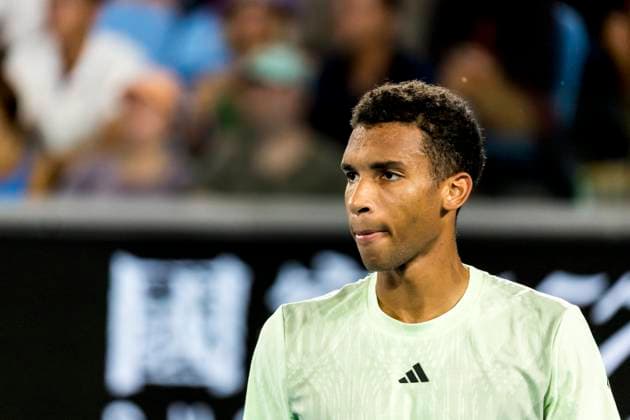 MELBOURNE, VIC - JANUARY 20: Felix Auger-Aliassime of Canada in action during the 3rd round of the 2024 Australian Open on January 20 2024, at Melbourne Park in Melbourne, Australia. (Photo by Jason Heidrich Icon Sportswire) TENNIS: JAN 20 Australian Open EDITORIAL USE ONLY Icon240120276