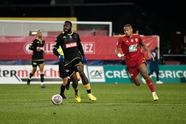 Youssouf FOFANA (ASM) et Tairyk ARCONTE (RAF) Rodez Aveyron Football vs. AS Monaco pour 16eme de finale de la Coupe de France au Stade Paul Lignon de Rodez, le 20 janvier 2024. FOOTBALL : Rodez AF vs. AS Monaco - Coupe de France - 20 01 2024 ValentinaClaret Panoramic 