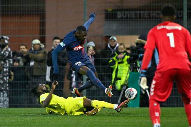 Randal Kolo Muani ( 10 - PSG ) and Jimmy Halby ( 7 - Orleans ) during the French Cup match between US Orleans and Paris Saint Germain at Stade de la Source on January 20, 2024 in Orleans, France. ( Photo by federico pestellini panoramic ) - FOOTBALL : Orleans vs PSG - Coupe de France - 20 01 2024 FedericoPestellini Panoramic 