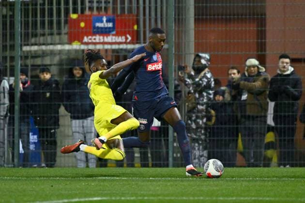 Randal Kolo Muani ( 10 - PSG ) and Jimmy Halby ( 7 - Orleans ) during the French Cup match between US Orleans and Paris Saint Germain at Stade de la Source on January 20, 2024 in Orleans, France. ( Photo by federico pestellini panoramic ) - FOOTBALL : Orleans vs PSG - Coupe de France - 20 01 2024 FedericoPestellini Panoramic 