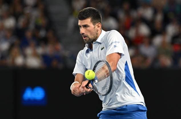TENNIS AUSTRALIAN OPEN, Novak Djokovic of Serbia returns during his 4th round match against Adrian Mannarino of France on Day 8 of the 2024 Australian Open at Melbourne Park in Melbourne, Sunday, January 21, 2024. ( NO ARCHIVING, EDITORIAL USE ONLY, NO USE IN BOOKS WITHOUT CONSENT MELBOURNE VICTORIA AUSTRALIA  Copyright: xLUKASxCOCHx 20240121001891689360