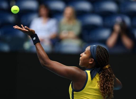 (240121) -- MELBOURNE, Jan. 21, 2024 -- Coco Gauff serves during the women s singles 4th round match between Coco Gauff of the United States and Magdalena Frech of Poland at Australian Open tennis tournament in Melbourne, Australia, Jan. 21, 2024. ) (SP)AUSTRALIA-MELBOURNE-TENNIS-AUSTRALIAN OPEN MaxPing 