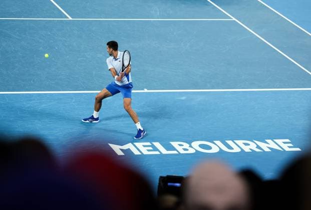 (240121) -- MELBOURNE, Jan. 21, 2024 -- Novak Djokovic of Serbia returns a shot during the men s singles 4th round match between Novak Djokovic of Serbia and Adrian Mannarino of France at Australian Open tennis tournament in Melbourne, Australia, Jan. 21, 2024. ) (SP)AUSTRALIA-MELBOURNE-TENNIS-AUSTRALIAN OPEN MaxPing 