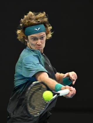 TENNIS AUSTRALIAN OPEN, Andrey Rublev of Russia returns during his 4th round match against Alex de Minaur of Australia on Day 8 of the 2024 Australian Open at Melbourne Park in Melbourne, Sunday, January 21, 2024. ( NO ARCHIVING, EDITORIAL USE ONLY, NO USE IN BOOKS WITHOUT CONSENT MELBOURNE VICTORIA AUSTRALIA  Copyright: xLUKASxCOCHx 20240121001891716633