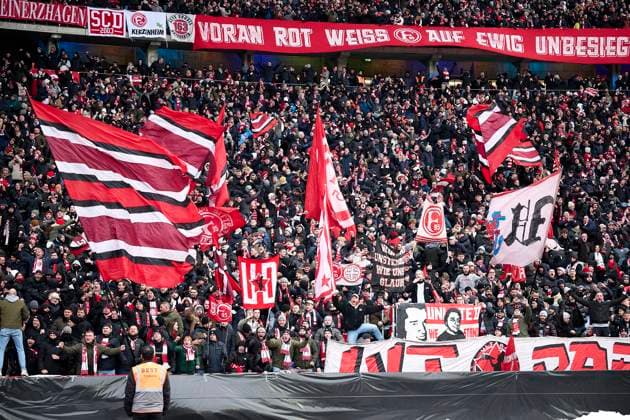 Duesseldorf Fans beim Torjubel, GER, Hertha BSC vs. Fortuna Duesseldorf, Fussball Herren, 2. Bundesliga, Saison 2023 2024, 18. Spieltag, 21.01.2024. (DFL REGULATIONS PROHIBIT ANY USE OF PHOTOGRAPHS AS IMAGE SEQUENCES AND OR QUASI - VIDEO). GER, Hertha BSC vs. Fortuna Duesseldorf, Fussball Herren, 2. Bundesliga, Saison 2023 2024, 18. Spieltag, 21.01.2024. Berlin