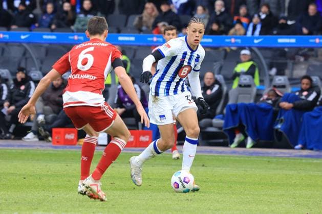 DEU, DFL, 2. FBL, Hertha BSC vs. Fortuna Duesseldorf, 21.01.2024, Berliner Olympiastadion, Berlin, DEU, DFL, 2. FBL, Hertha BSC vs. Fortuna Duesseldorf, im Bild 2:1 durch Derry Scherhant (Hertha BSC Berlin 39), Yannik Engelhardt (Fortuna Duesseldorf 6) DFL - regulations prohibit any use of Photographs as image sequences and or quasi-video Foto: Juergen Engler nordphoto GmbH