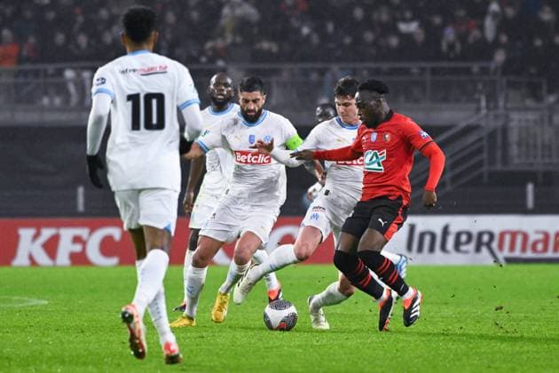 Arnaud Kalimuendo ( 9 - Rennes ) and Leonardo BALERDI ( Olympique Marseille ) during the French Cup match between Stade Rennais FC and Olympique de Marseille at Roazhon Park on January 21, 2024 in Rennes, France. ( Photo by federico pestellini panoramic ) - FOOTBALL : Rennes vs Marseille - Coupe de France - 21 01 2024 FedericoPestellini Panoramic 