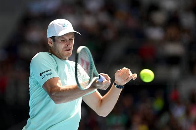 TENNIS AUSTRALIAN OPEN, Hubert Hurkacz of Poland in action during his 4th round match against Arthur Cazaux of France on Day 9 of the 2024 Australian Open at Melbourne Park in Melbourne, Monday, January 22, 2024. ( NO ARCHIVING, EDITORIAL USE ONLY, NO USE IN BOOKS WITHOUT CONSENT MELBOURNE VICTORIA AUSTRALIA  Copyright: xLUKASxCOCHx 20240122001892134994
