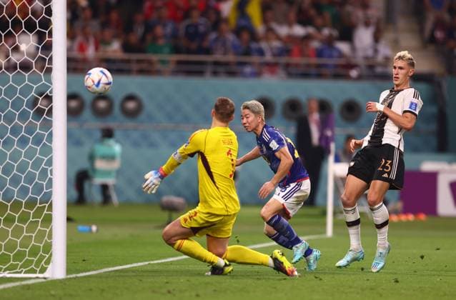 Germany v Japan - FIFA World Cup, WM, Weltmeisterschaft, Fussball 2022 - Group E - Khalifa International Stadium November 23, 2022, Doha: Doha, Qatar, 23rd November 2022. Takuma Asano of Japan scores the winning goal past Manuel Neuer of Germany during the FIFA World Cup 2022 match at Khalifa International Stadium, Doha. Doha EDITORIAL USE ONLY Copyright: xx ZUMA-20221123_zaf_si1_098.jpg DavidxKleinx csmphotothree008239