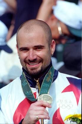 Andre Kirk Agassi is an American former world No. 1 tennis player.The high point for Agassi was winning the men s singles gold medal at the Olympic Games, Olympische Spiele, Olympia, OS in Atlanta, beating Sergi Bruguera of Spain in the final. 