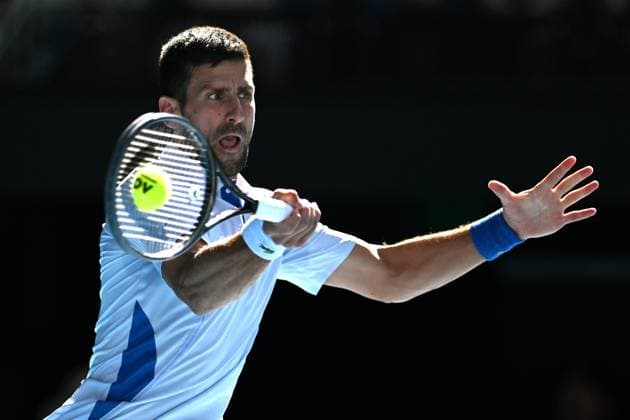 TENNIS AUSTRALIAN OPEN, Novak Djokovic of Serbia plays a return shot during his quarter final match against Taylor Fritz of the USA on Day 10 of the 2024 Australian Open at Melbourne Park in Melbourne, Tuesday, January 23, 2024. ( NO ARCHIVING, EDITORIAL USE ONLY, NO USE IN BOOKS WITHOUT CONSENT MELBOURNE VICTORIA AUSTRALIA  Copyright: xLUKASxCOCHx 20240123001892523437