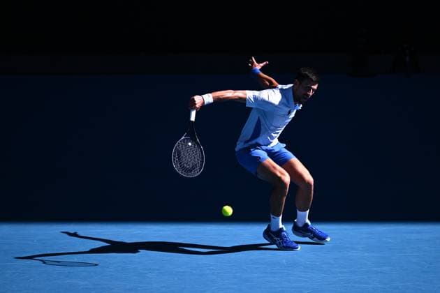 TENNIS AUSTRALIAN OPEN, Novak Djokovic of Serbia plays a return shot during his quarter final match against Taylor Fritz of the USA on Day 10 of the 2024 Australian Open at Melbourne Park in Melbourne, Tuesday, January 23, 2024. ( NO ARCHIVING, EDITORIAL USE ONLY, NO USE IN BOOKS WITHOUT CONSENT MELBOURNE VICTORIA AUSTRALIA  Copyright: xLUKASxCOCHx 20240123001892528681
