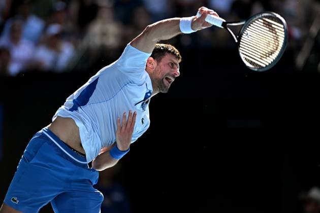 TENNIS AUSTRALIAN OPEN, Novak Djokovic of Serbia serves during his quarter final match against Taylor Fritz of the USA on Day 10 of the 2024 Australian Open at Melbourne Park in Melbourne, Tuesday, January 23, 2024. ( NO ARCHIVING, EDITORIAL USE ONLY, NO USE IN BOOKS WITHOUT CONSENT MELBOURNE VICTORIA AUSTRALIA  Copyright: xLUKASxCOCHx 20240123001892531535