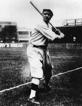 Babe Ruth (1895-1948) Babe Ruth is shown here in his batting stance. Most fans think of Ruth as the greatest player in baseball history. He held the record for most home runs in a career with 714 until 1974 when Hank Aaron broke his record. He was the most acclaimed athlete in an era when spectator sports enthralled Americans. EDITORIAL USE ONLY Copyright: xx 45.311 x picturehistory012356