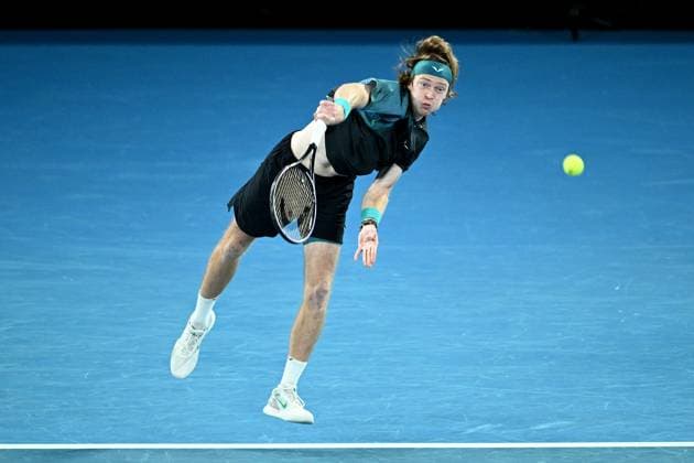 TENNIS AUSTRALIAN OPEN, Andrey Rublev of Russia serves during his quarter final match against Jannik Sinner of Italy on Day 10 of the 2024 Australian Open at Melbourne Park in Melbourne, Tuesday, January 23, 2024. ( NO ARCHIVING, EDITORIAL USE ONLY, NO USE IN BOOKS WITHOUT CONSENT MELBOURNE VICTORIA AUSTRALIA  Copyright: xJOELxCARRETTx 20240123001892593725