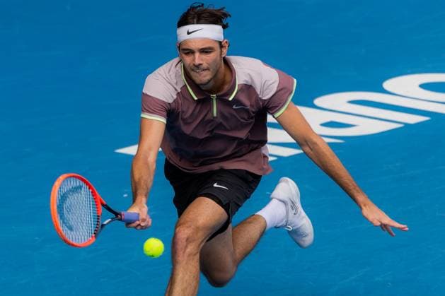 (240123) -- MELBOURNE, Jan. 23, 2024 -- Taylor Fritz competes during the men s singles quarterfinal match between Novak Djokovic of Serbia and Taylor Fritz of the United States at Australian Open tennis tournament in Melbourne, Australia, Jan. 23, 2024. (Photo by Xinhua) (SP)AUSTRALIA-MELBOURNE-TENNIS-AUSTRALIAN OPEN ChuxChen 