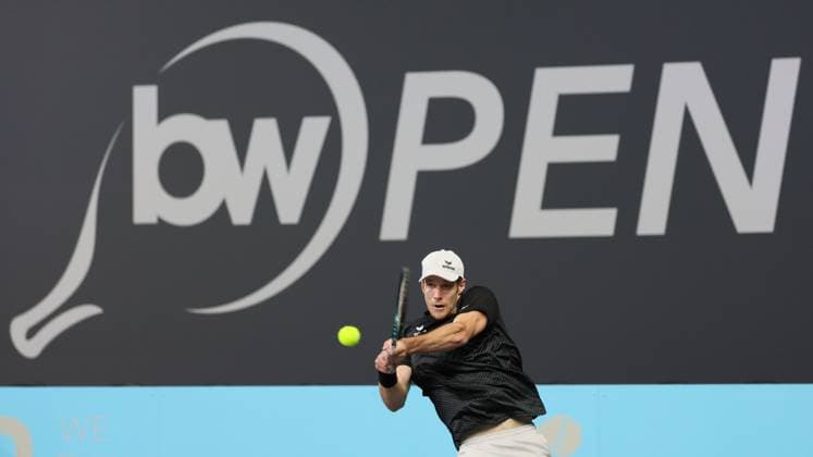 Belgian Joris De Loore pictured in action during a tennis match against Hungarian Piros, in the first round of the men s singles at the BW Open ATP, Tennis Herren Challenger 125 tournament, in Louvain-la-Neuve, Tuesday 23 January 2024. THE BW Open takes place from 22 to 28 January. BENOITxDOPPAGNE  x84510595x