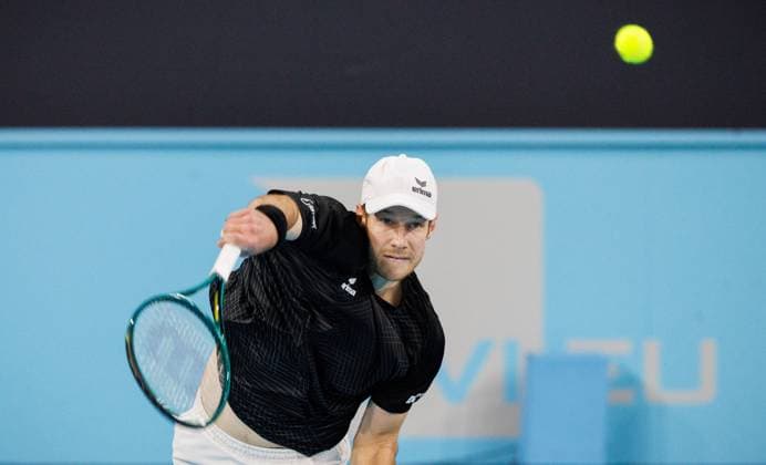Belgian Joris De Loore pictured in action during a tennis match against Hungarian Piros, in the first round of the men s singles at the BW Open ATP, Tennis Herren Challenger 125 tournament, in Louvain-la-Neuve, Tuesday 23 January 2024. THE BW Open takes place from 22 to 28 January. BENOITxDOPPAGNE  x84515788x