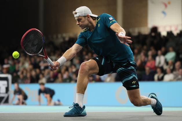 Belgian Zizou Bergs pictured in action during a tennis match against his compatriot Goffin, in the first round of the men s singles at the BW Open ATP, Tennis Herren Challenger 125 tournament, in Louvain-la-Neuve, Tuesday 23 January 2024. THE BW Open takes place from 22 to 28 January. BENOITxDOPPAGNE  x84520734x