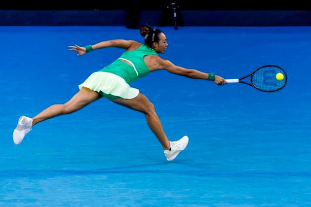 MELBOURNE, VIC - JANUARY 24: Qinwen Zheng of China in action during the Quarterfinals of the 2024 Australian Open on January 24 2024, at Melbourne Park in Melbourne, Australia. (Photo by Jason Heidrich Icon Sportswire) TENNIS: JAN 24 Australian Open EDITORIAL USE ONLY Icon240124167