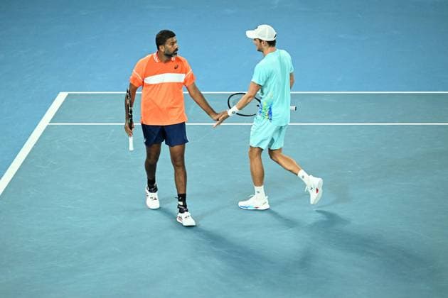 TENNIS AUSTRALIAN OPEN, Matthew Ebden (right) of Australia and Rohan Bopanna of India during their Men?s Doubles semifnal against Tomas Machac of Czech Republic and Zhizhen Zhang of China on Day 12 of the 2024 Australian Open at Melbourne Park in Melbourne, Thursday, January 25, 2024. ( NO ARCHIVING, EDITORIAL USE ONLY, NO USE IN BOOKS WITHOUT CONSENT MELBOURNE VICTORIA AUSTRALIA  Copyright: xJAMESxROSSx 20240125001893300695