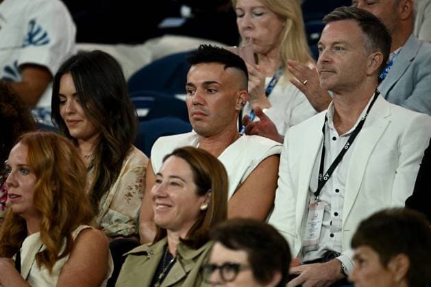 TENNIS AUSTRALIAN OPEN, Australia musician Anthony Callea (centre) with his partner Tim Campbell (right) watch Aryna Sabalenka of Belarus in action during her Women?s Singles semifinal against Coco Gauff of the USA on Day 12 of the 2024 Australian Open at Melbourne Park in Melbourne, Thursday, January 25, 2024. ( NO ARCHIVING, EDITORIAL USE ONLY, NO USE IN BOOKS WITHOUT CONSENT MELBOURNE VICTORIA AUSTRALIA  Copyright: xJOELxCARRETTx 20240125001893368284