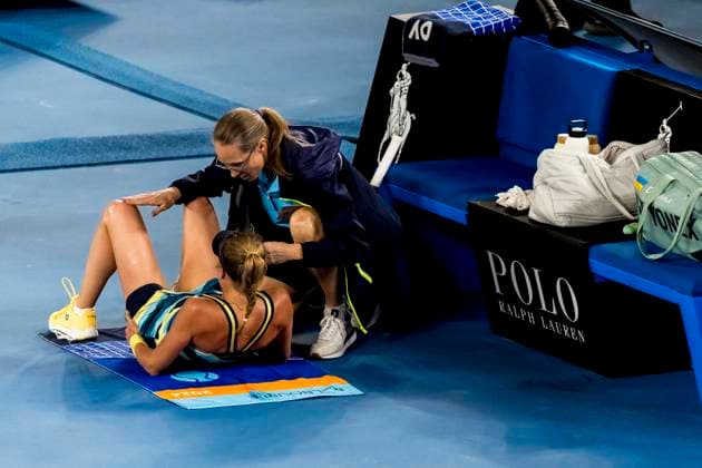 MELBOURNE, VIC - JANUARY 25: Dayana Yastremska of Ukraine seeks treatment from a health professional during the semifinals of the 2024 Australian Open on January 25 2024, at Melbourne Park in Melbourne, Australia. (Photo by Jason Heidrich Icon Sportswire) TENNIS: JAN 25 Australian Open EDITORIAL USE ONLY Icon240125233