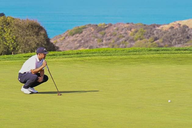 January 25, 2024: Xander Schauffele lines up a putt on the 12th hole during the second round of the Farmers Insurance Open at Torrey Pines North in San Diego, California. CSM San Diego USA - ZUMAc04_ 20240125_zma_c04_008 Copyright: xJustinxFinex