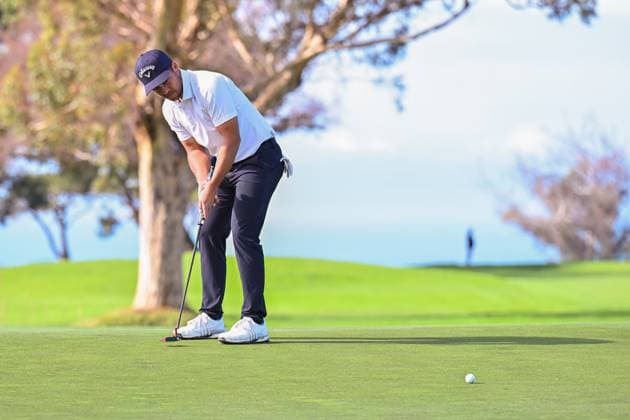 January 25, 2024: Xander Schauffele putts on the 13th hole during the second round of the Farmers Insurance Open at Torrey Pines North in San Diego, California. CSM San Diego USA - ZUMAc04_ 20240125_zma_c04_009 Copyright: xJustinxFinex