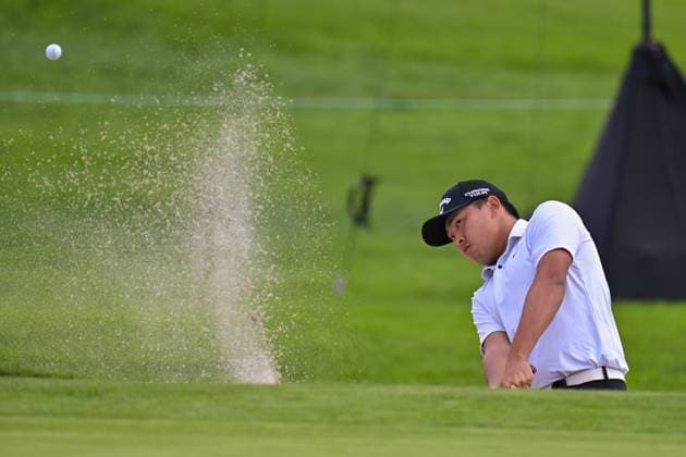 January 25, 2024: Kevin Yu hits a shot from the bunker on the 15th hole during the second round of the Farmers Insurance Open at Torrey Pines South in San Diego, California. CSM San Diego USA - ZUMAc04_ 20240125_zma_c04_035 Copyright: xJustinxFinex