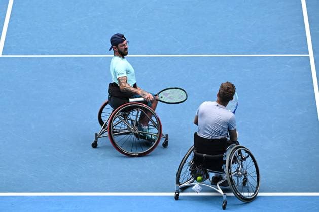 TENNIS AUSTRALIAN OPEN, Heath Davidson (left) of Australia and Robert Shaw of Canada in action during their Men?s Wuad Wheelchair Doubles semifinal against Andy Lapthorne of United Kingdom and David Wagner of the USA on Day 13 of the 2024 Australian Open at Melbourne Park in Melbourne, Friday, January 26, 2024. ( NO ARCHIVING, EDITORIAL USE ONLY, NO USE IN BOOKS WITHOUT CONSENT MELBOURNE VICTORIA AUSTRALIA  Copyright: xJOELxCARRETTx 20240126001893708313