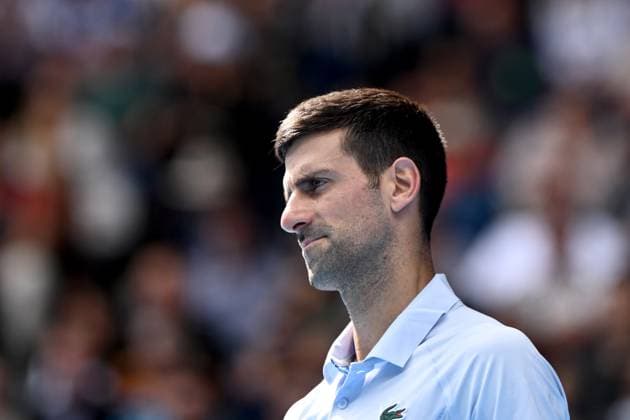 TENNIS AUSTRALIAN OPEN, Novak Djokovic of Serbia during his Men?s semifinal against Jannik Sinner of Italy on Day 13 of the 2024 Australian Open at Melbourne Park in Melbourne, , Friday, January 26, 2024. ( NO ARCHIVING, EDITORIAL USE ONLY, NO USE IN BOOKS WITHOUT CONSENT MELBOURNE VICTORIA AUSTRALIA  Copyright: xJOELxCARRETTx 20240126001893766234