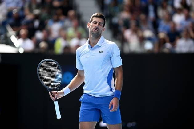 TENNIS AUSTRALIAN OPEN, Novak Djokovic of Serbia during his Men?s semifinal against Jannik Sinner of Italy on Day 13 of the 2024 Australian Open at Melbourne Park in Melbourne, , Friday, January 26, 2024. ( NO ARCHIVING, EDITORIAL USE ONLY, NO USE IN BOOKS WITHOUT CONSENT MELBOURNE VICTORIA AUSTRALIA  Copyright: xJOELxCARRETTx 20240126001893766368