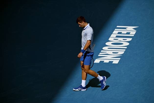TENNIS AUSTRALIAN OPEN, Novak Djokovic of Serbia during his Men?s semifinal against Jannik Sinner of Italy on Day 13 of the 2024 Australian Open at Melbourne Park in Melbourne, Friday, January 26, 2024. ( NO ARCHIVING, EDITORIAL USE ONLY, NO USE IN BOOKS WITHOUT CONSENT MELBOURNE VICTORIA AUSTRALIA  Copyright: xJAMESxROSSx 20240126001893768696