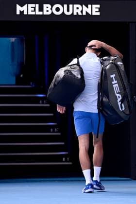TENNIS AUSTRALIAN OPEN, Novak Djokovic of Serbia leaves the court following his loss in the Men?s semifinal to Jannik Sinner of Italy on Day 13 of the 2024 Australian Open at Melbourne Park in Melbourne, , Friday, January 26, 2024. ( NO ARCHIVING, EDITORIAL USE ONLY, NO USE IN BOOKS WITHOUT CONSENT MELBOURNE VICTORIA AUSTRALIA  Copyright: xJOELxCARRETTx 20240126001893792577