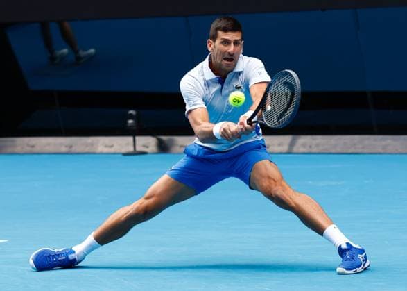 (240126) -- MELBOURNE, Jan. 26, 2024 -- Novak Djokovic of Serbia hits a return during his men s singles semifinal against Jannik Sinner of Italy at Australian Open tennis tournament in Melbourne, Australia, Jan. 26, 2024. (Photo by Xinhua) (SP)AUSTRALIA-MELBOURNE-TENNIS-AUSTRALIAN OPEN-MEN S SINGLES SEMIFINALS ChuxChen 