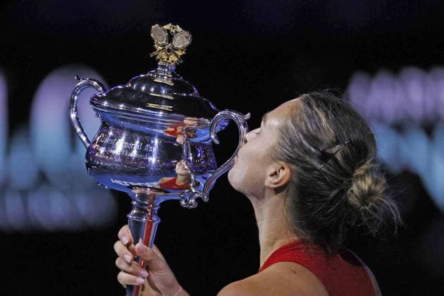 27th January 2024; Melbourne Park, Melbourne, Victoria, Australia; Australian Open Tennis Championship, Ladies singles final on Day 14; Aryna Sabalenka lifts the trophy after after winning the singles finals against Qinwen Zheng (CHN)  ActionPlus12602638 NaFoto