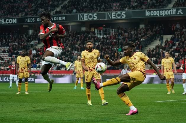Evann Guesssand (OGC Nice) - Fali CandÃ (FC Metz) FOOTBALL : OGC Nice vs FC Metz - Ligue 1 Uber Eats - Nice - 27 01 2024 NorbertScanella Panoramic 