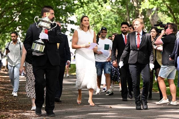 TENNIS AUSTRALIAN OPEN, Aryna Sabalenka of Belarusleaves after posing for a photo with the Daphne Akhurst Memorial Cup following her win over Qinwen Zheng of China in the Women?s Singles Final at the 2024 Australian Open tennis tournament in Melbourne, Sunday, January 28, 2024. ( NO ARCHIVING, EDITORIAL USE ONLY, NO USE IN BOOKS WITHOUT CONSENT MELBOURNE VICTORIA AUSTRALIA  Copyright: xJOELxCARRETTx 20240128001894577466