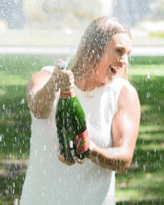 January 28, 2024: ARYNA SABALENKA of Belarus sprays champagne at her trophy photo call in Carlton Gardens after winning the WomenÃ¢â‚¬â ¢s Singles Final of the 2024 Australian Open in Melbourne Australia. Cal Media USA - ZUMAc04_ 20240128_faf_c04_005 Copyright: xSydneyxLowx