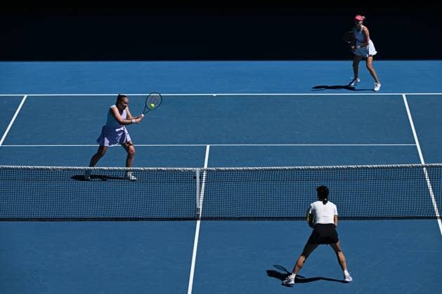 TENNIS AUSTRALIAN OPEN, Lyudmyla Kichenok (right) of Ukraine and Jelena Ostapemko (left) of Latvia in action during the Women?s Doubles final against Su-Wei Hsieh (bottom) of Chinese Taipei and Elise Mertens of Belgium on Rod Laver Arena on Day 15 of the 2024 Australian Open at Melbourne Park in Melbourne, Thursday, January 25, 2024. ( NO ARCHIVING, EDITORIAL USE ONLY, NO USE IN BOOKS WITHOUT CONSENT MELBOURNE VICTORIA AUSTRALIA  Copyright: xJAMESxROSSx 20240128001894656484