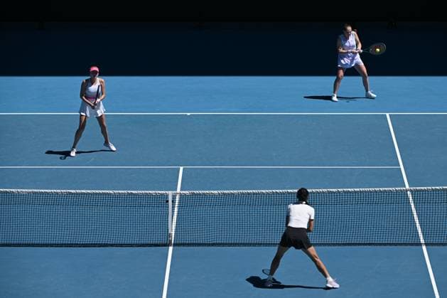 TENNIS AUSTRALIAN OPEN, Lyudmyla Kichenok (left) of Ukraine and Jelena Ostapenko (right)of Latvia in action during the Women?s Doubles final against Su-Wei Hsieh (bottom) of Chinese Taipei and Elise Mertens of Belgium on Rod Laver Arena on Day 15 of the 2024 Australian Open at Melbourne Park in Melbourne, Thursday, January 25, 2024. ( NO ARCHIVING, EDITORIAL USE ONLY, NO USE IN BOOKS WITHOUT CONSENT MELBOURNE VICTORIA AUSTRALIA  Copyright: xJAMESxROSSx 20240128001894661759
