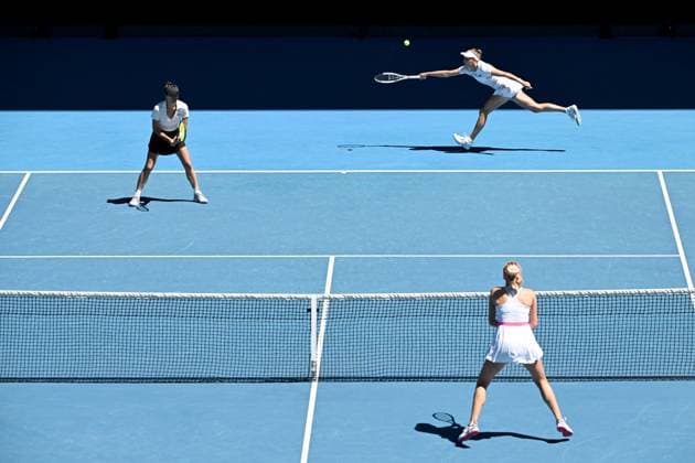 TENNIS AUSTRALIAN OPEN, Su-Wei Hsieh (left) of Chinese Taipei and Elise Mertens (right) of Belgium in action during the Women?s Doubles final against Lyudmyla Kichenok (bottom) of Ukraine and Jelena Ostapemko of Latvia on Rod Laver Arena on Day 15 of the 2024 Australian Open at Melbourne Park in Melbourne, Thursday, January 25, 2024. ( NO ARCHIVING, EDITORIAL USE ONLY, NO USE IN BOOKS WITHOUT CONSENT MELBOURNE VICTORIA AUSTRALIA  Copyright: xJAMESxROSSx 20240128001894662089