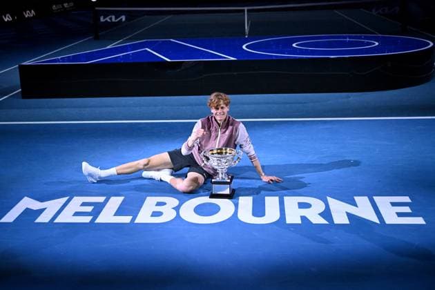 TENNIS AUSTRALIAN OPEN, Jannik Sinner of Italy poses for photographs with the Norman Brookes Challenge Cup following his win in the Men?s Singles final against Daniil Medvedev of Russia on Rod Laver Arena on Day 15 of the 2024 Australian Open at Melbourne Park in Melbourne, Sunday, January 28, 2024. ( NO ARCHIVING, EDITORIAL USE ONLY, NO USE IN BOOKS WITHOUT CONSENT MELBOURNE VICTORIA AUSTRALIA  Copyright: xJOELxCARRETTx 20240129001894785869